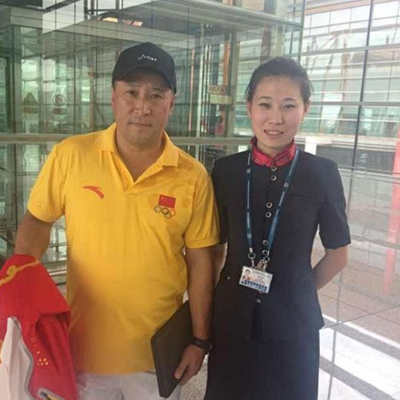 齐红阳与中国羽毛球队总教练李永波合影